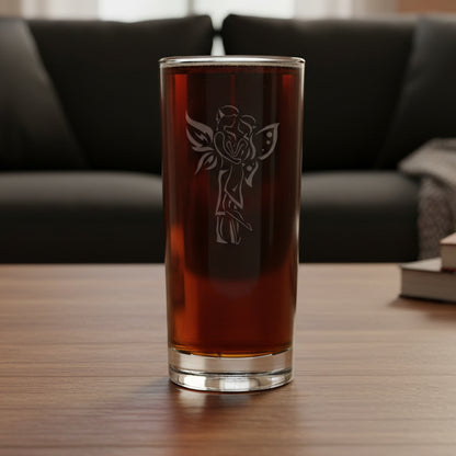 Cooler glass with a Fairy Couple design with a dark couch in the background