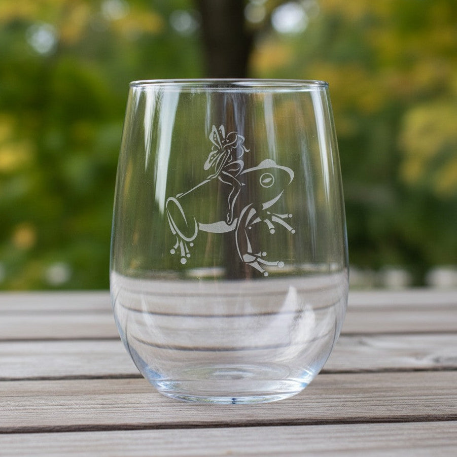 17oz Stemless Wine Glass with an etched image of an frog etched image with a background of a misty forest