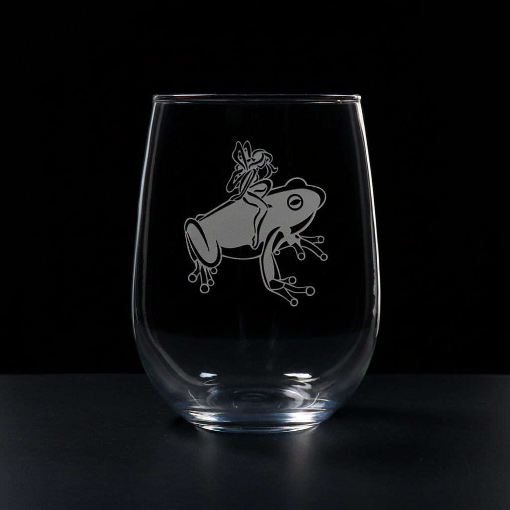 17oz Stemless Wine Glass with an etched image of a frog on a  black background