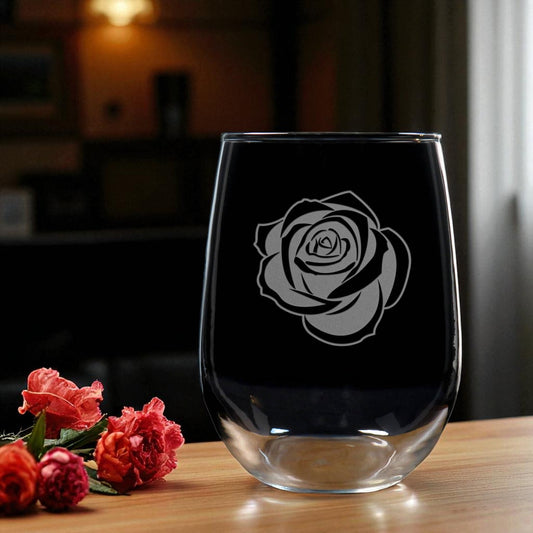Elegant 17oz stemless wine glass featuring a deeply etched rose design. Hand-carved and personalized for the perfect anniversary, birthday, or Christmas gift for her. Durable, modern, and uniquely handcrafted.
