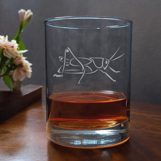13oz Whiskey Glass with a sandblasted image of a grasshopper- copyright Hues in Glass