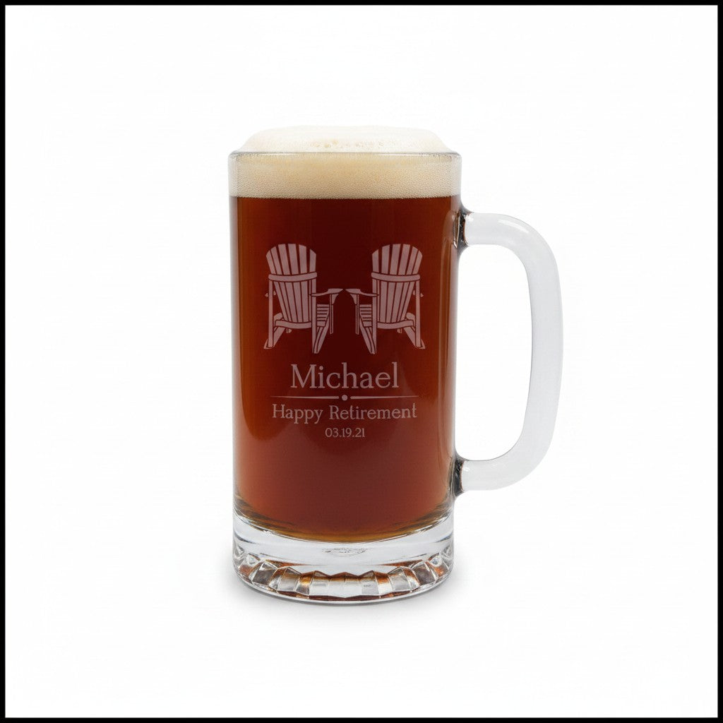 A clear glass beer mug filled with amber beer and topped with white foam, featuring a handle on the right. The front is engraved with two Adirondack chairs, the name 'Michael', and 'Happy Retirement 03.