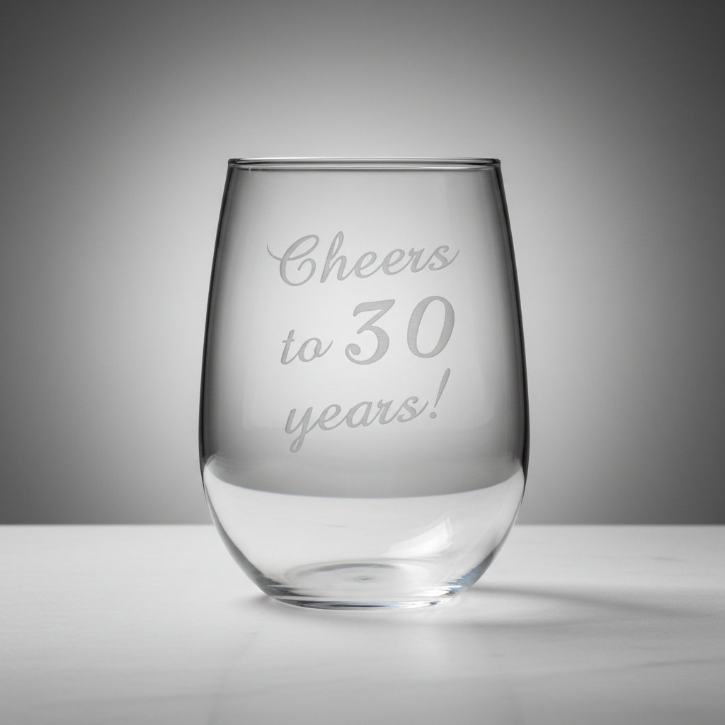Clear glass stemless wine glass with 'Cheers to 30 years!' 