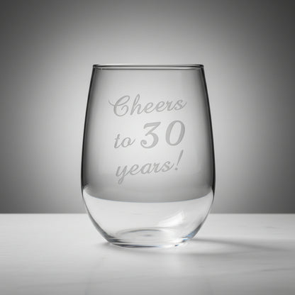 Clear glass stemless wine glass with 'Cheers to 30 years!' 