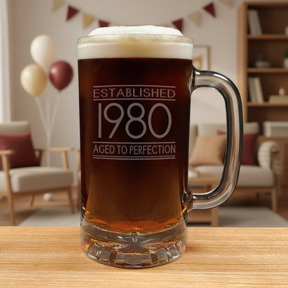 Beer mug with 'Established 1980 Aged to Perfection' text on a wooden surface 
