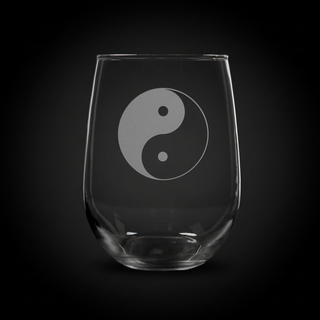 Clear glass with engraved fish design and 'Matthew' text with a black background