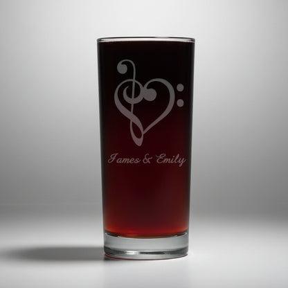 Heart design made from upside down Treble Clef and Bass Clef Cooler Glass on a light grey background