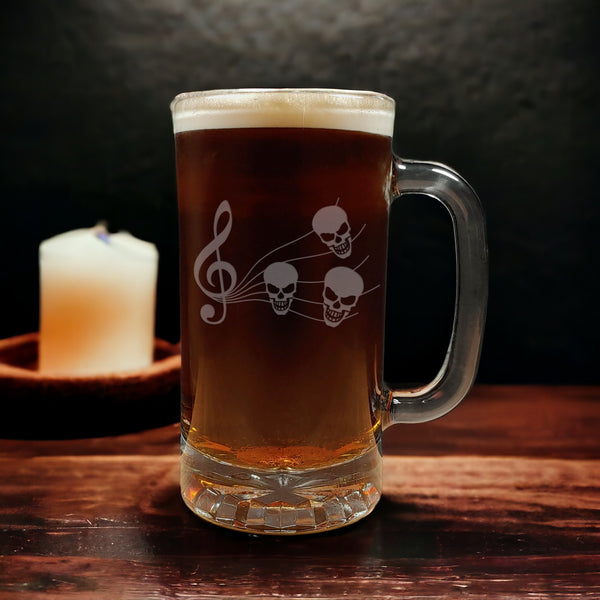 Music Staff with Skulls as Notes Beer Mug with Dark Beer - Copyright Hues in Glass