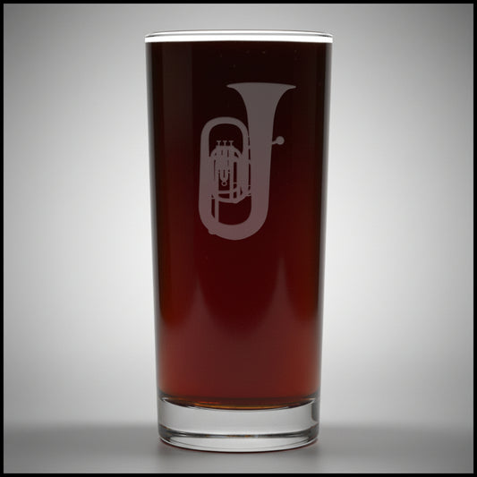 Cooler glass with a sand etched image of a tuba - with a light grey background 