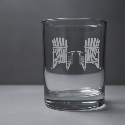 Clear glass with engraved design of two chairs