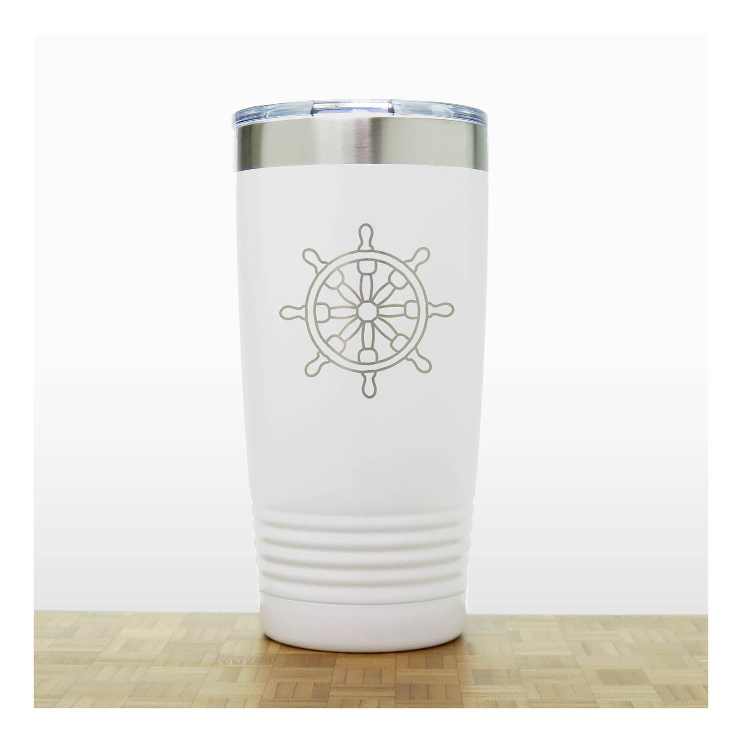 White tumbler with a ship's wheel design on a white background