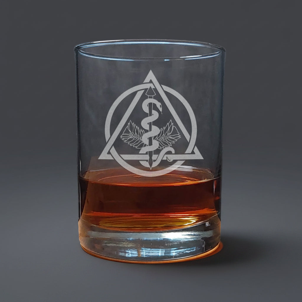Glass with an engraved dental symbol background