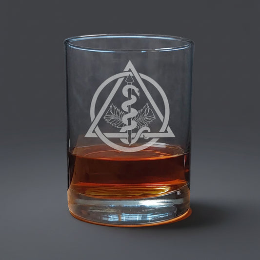 Glass with an engraved dental symbol background