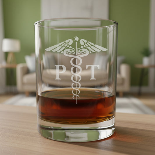 Physical Therapist Whiskey Glass with a etched image of a Caduceus and the designation letters P T on either side of it - Copyright Hues in Glass