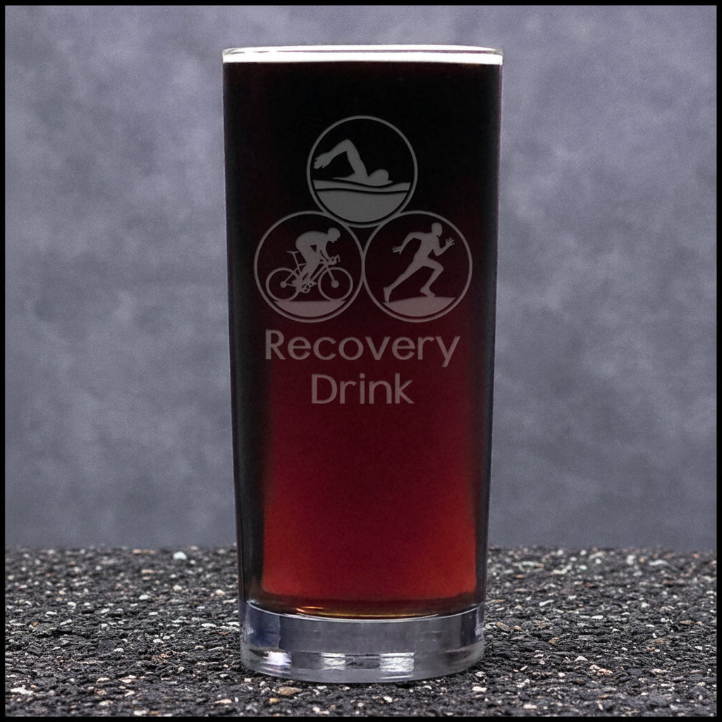 Glass with 'Recovery Drink' text and icons on a gray background