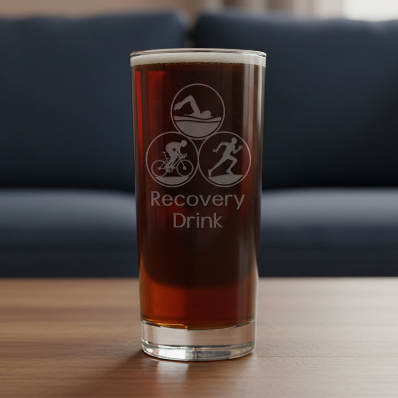 Glass with 'Recovery Drink' text and Running, Biking, and Cyclist