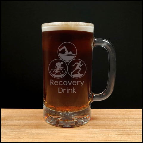 Triathlon 16oz Beer Mug with dark beer - the words Recovery Drink in sentence case under image- Copyright Hues in Glass