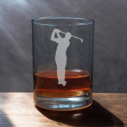 A 13 oz Whisky Glass with an etched golfer - Copyright Hues in Glass