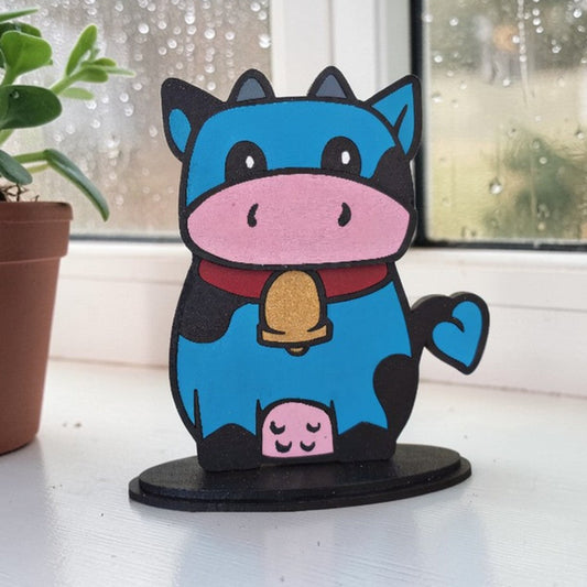 Spotted Cow in front of a rainy window