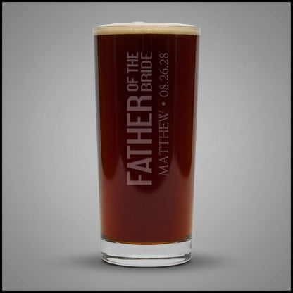 Personalized glass with 'Father of the Bride' text on a gray background