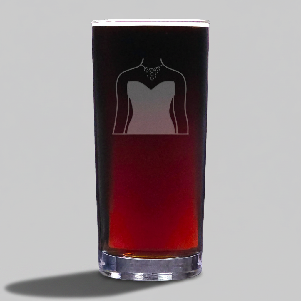 Glass with a design of a strapless dress and necklace on a pale grey background