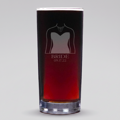 Glass with a bride's gown design and 'BRIDE' text on a light grey background