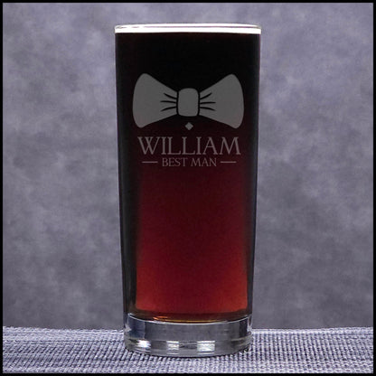 Personalized glass with bow tie design and 'WILLIAM BEST MAN' text on a gray background